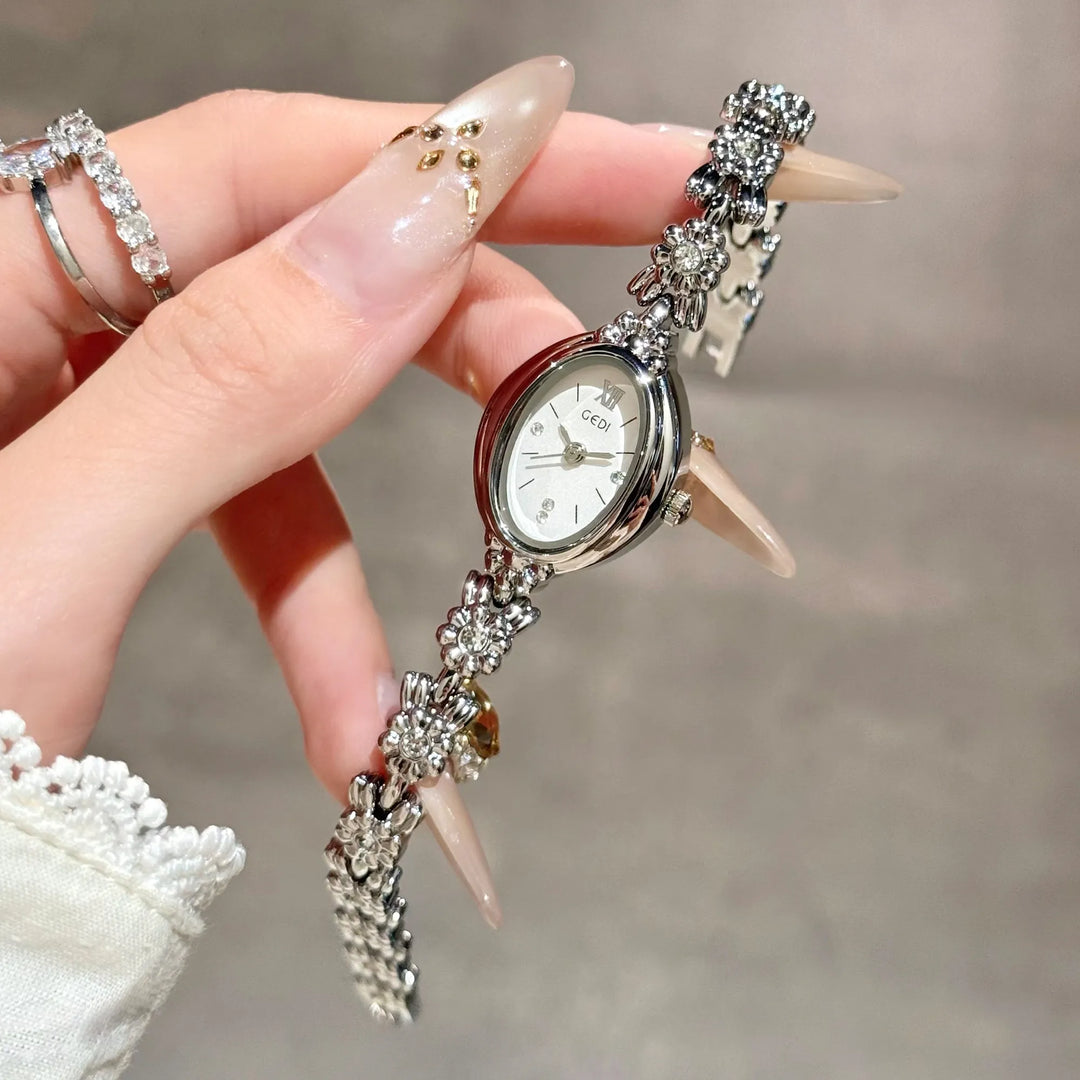 GEDI Gold Bracelet Wrist Watch Women Elegant Oval Dial Diamond-Embedded Quartz Ladies Watches Luxury Niche Ladies Dress Watch