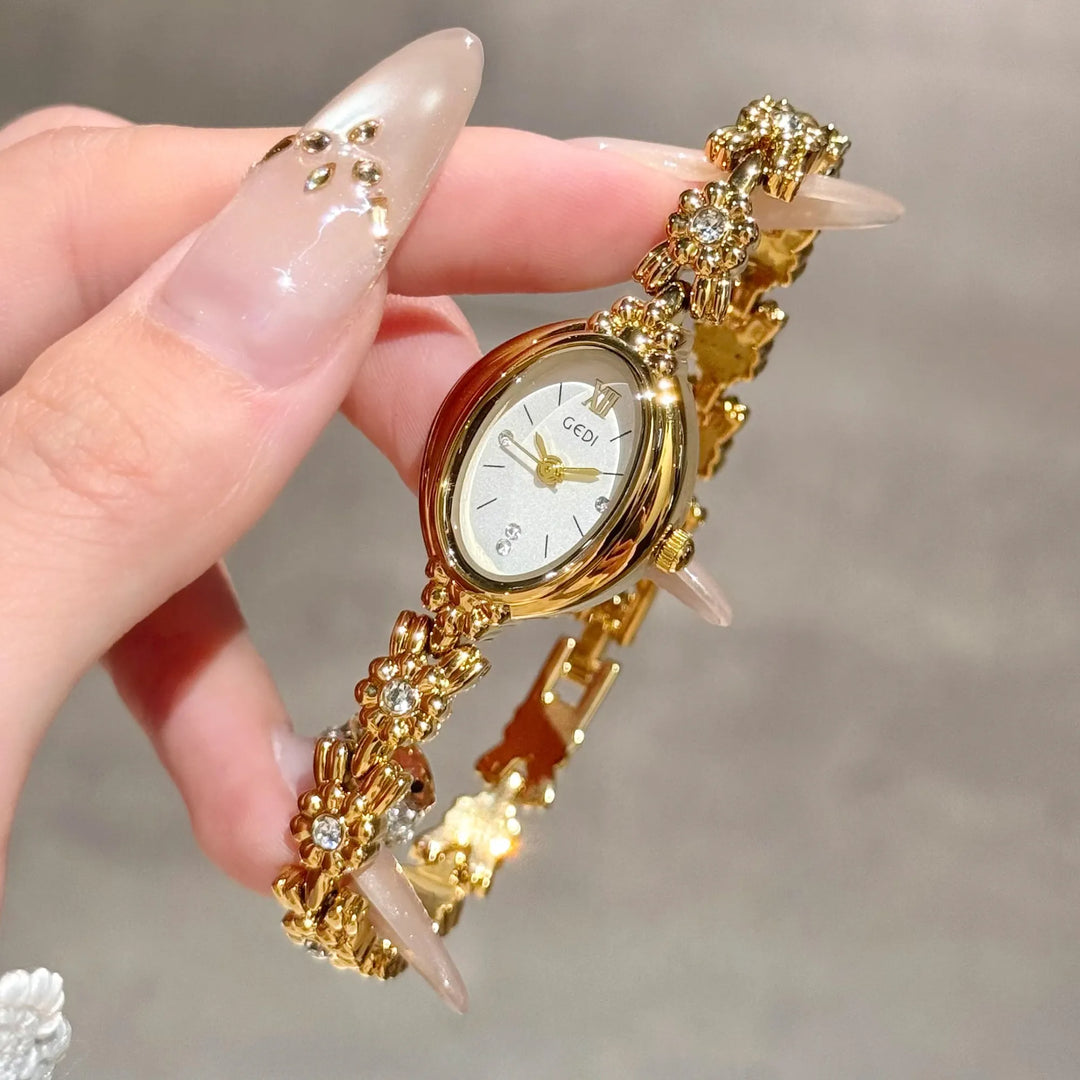 GEDI Gold Bracelet Wrist Watch Women Elegant Oval Dial Diamond-Embedded Quartz Ladies Watches Luxury Niche Ladies Dress Watch