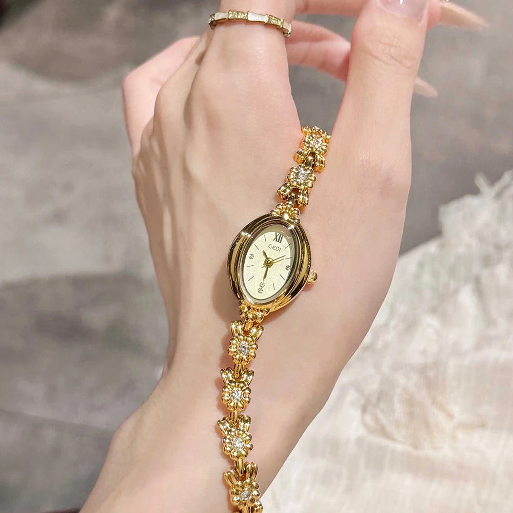 GEDI Gold Bracelet Wrist Watch Women Elegant Oval Dial Diamond-Embedded Quartz Ladies Watches Luxury Niche Ladies Dress Watch