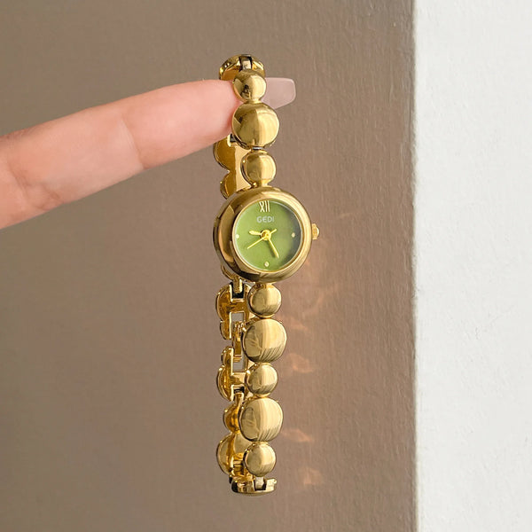 Gedi 2026 new woman watch luxury vintage red round dial quartz watches, gold bracelet ladies quartz wristwatch elegant