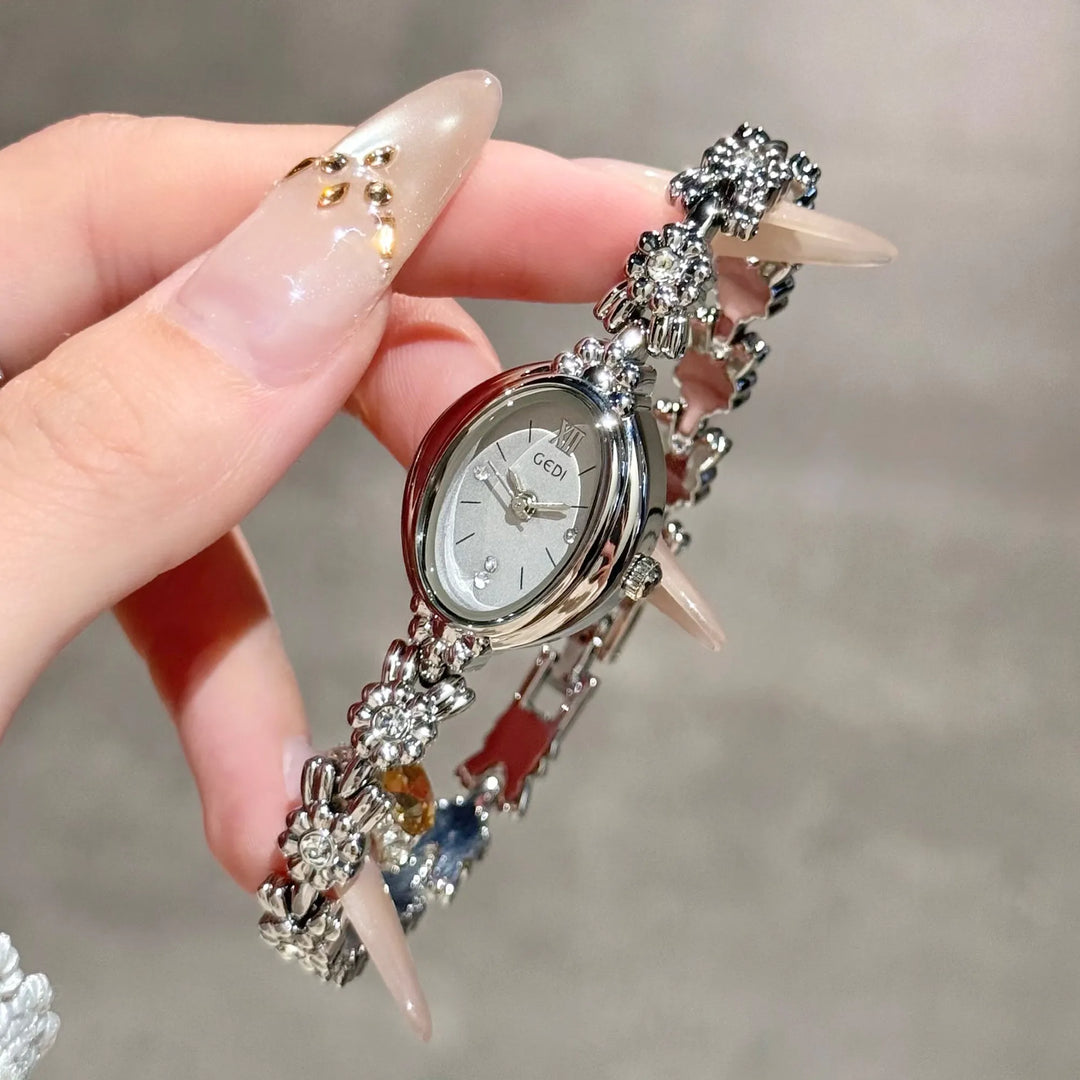 GEDI Gold Bracelet Wrist Watch Women Elegant Oval Dial Diamond-Embedded Quartz Ladies Watches Luxury Niche Ladies Dress Watch
