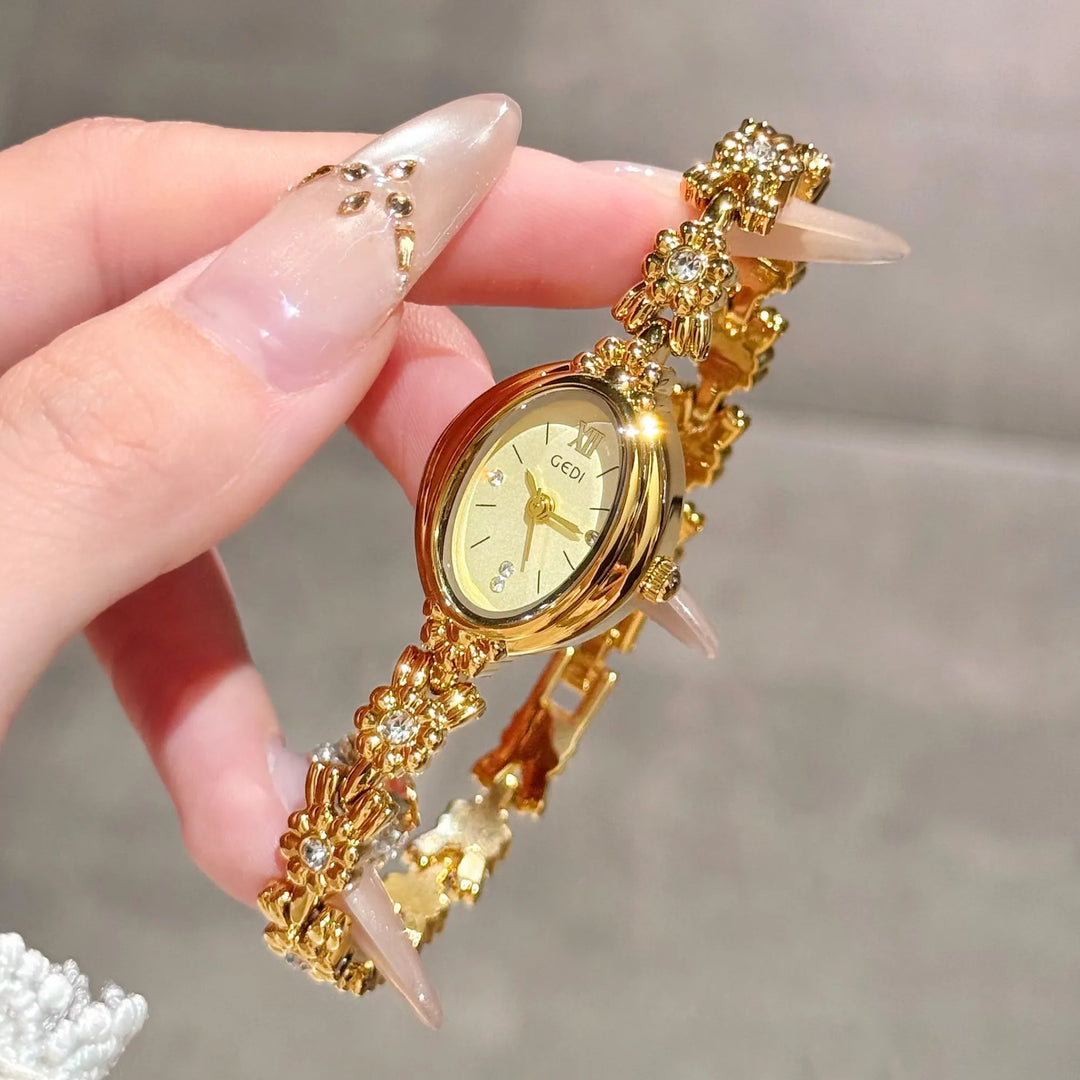 GEDI Gold Bracelet Wrist Watch Women Elegant Oval Dial Diamond-Embedded Quartz Ladies Watches Luxury Niche Ladies Dress Watch