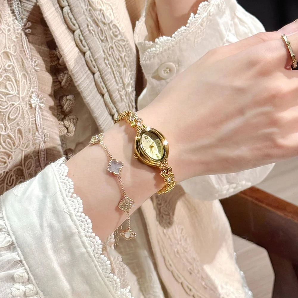 GEDI Gold Bracelet Wrist Watch Women Elegant Oval Dial Diamond-Embedded Quartz Ladies Watches Luxury Niche Ladies Dress Watch